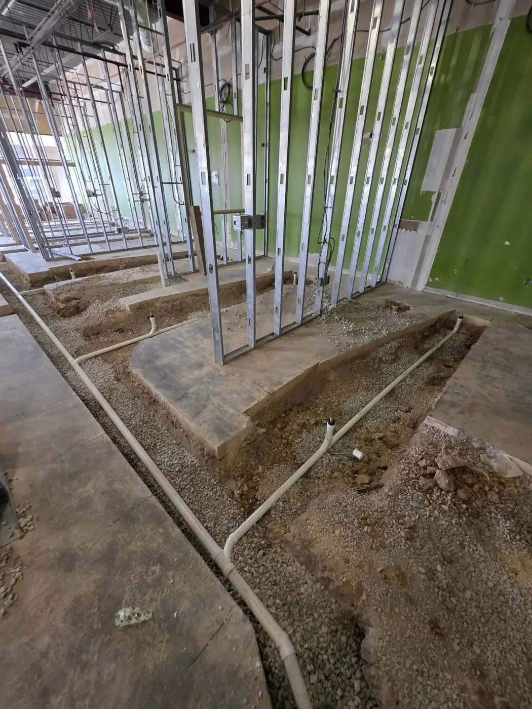 Drain line installed in a slab trench